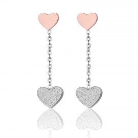 Σκουλαρίκια με το σύμβολο της αγάπης την καρδιά σε ροζ χρώμα OK1049