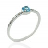 Ring white gold K14 solitaire with natural stone blue topaz and white zircons 18135W