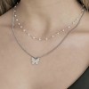 Necklace with the butterfly and with white pearls made of stainless steel  CK1675