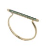 Ring in K14 gold with a bar on the head with natural zircons in green color 9554