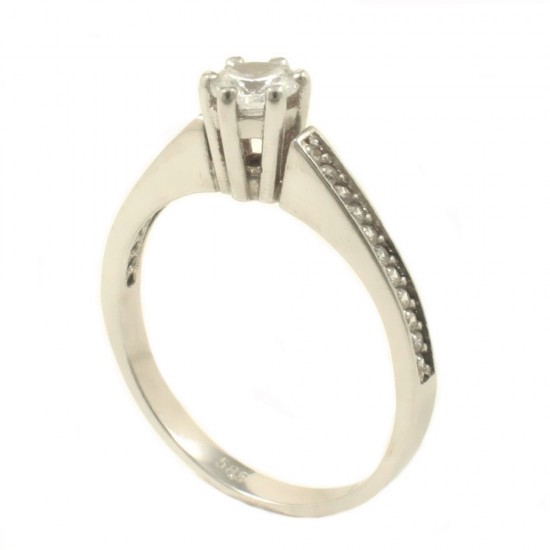 Ring in white gold K14 solitaire with natural zircons in white color in the center and on the sides 25225