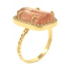 Ring in K14 gold with natural raw topaz and natural zircons 