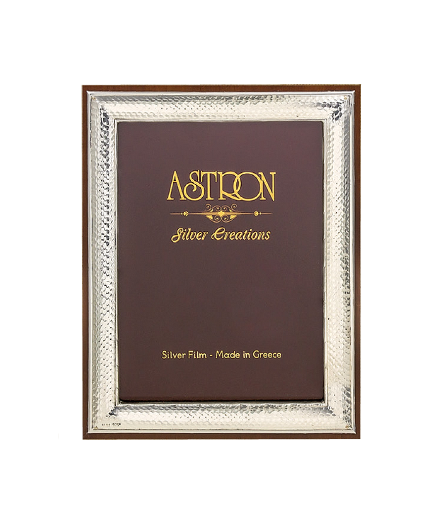 Silver-plated photo frame with wooden base and stand. Frame dimensions 24.5X19.5 centimeters.