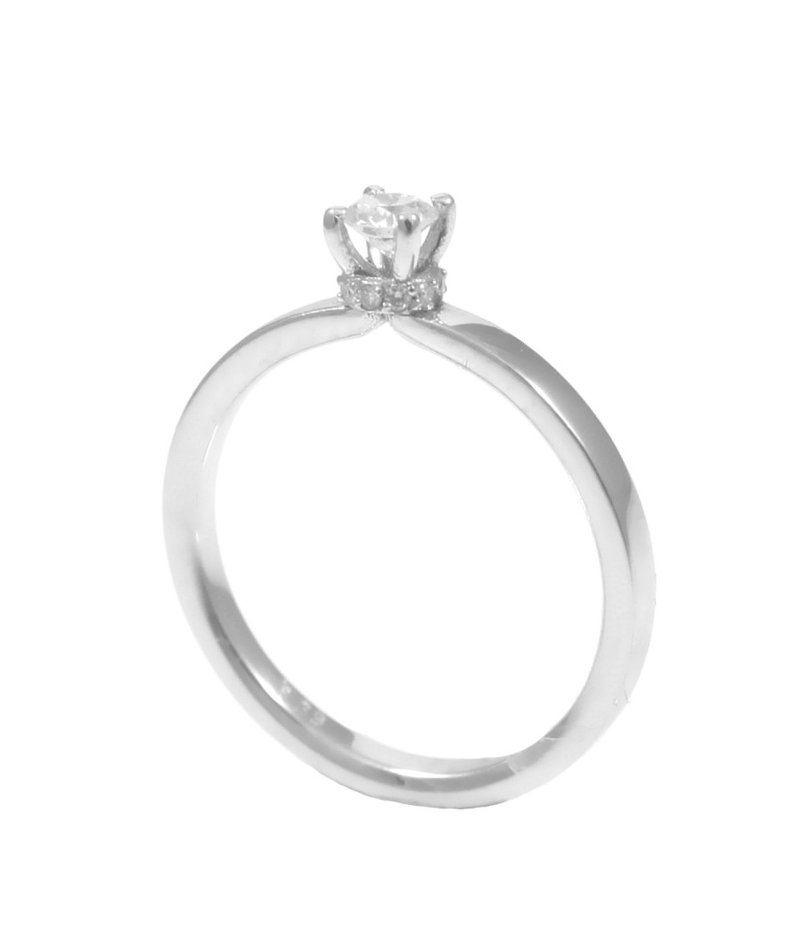 Ring in 750 white gold, solitaire, with 11 natural diamonds weighing 0.18ct in the center, 0.04ct on the sides